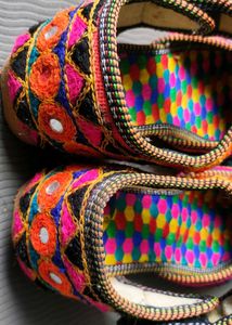 Jaipuri juttis or Rajasthani mojaris.