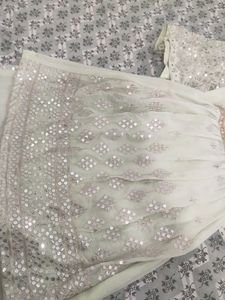A Light green Sharara suit