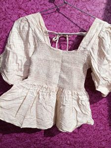 Smocked Peplum Top