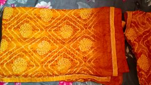 yellow chunri print saree