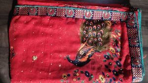 Red Saree With Peacock  Design   And  Stone Work