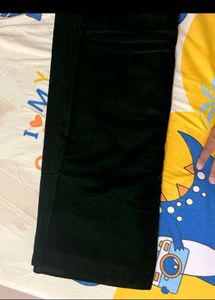 Elegant Dark Green  Saree with  Sleevless Blouse