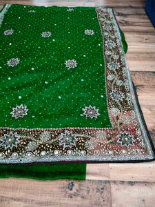 Green heavy party wear  handwork Saree