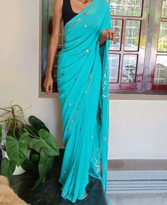 Teal Blue Colour Saree With Heavy Work Pallu.