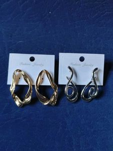 Fashionable Silver and golden Tone Dangle Earrings