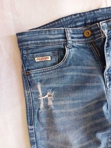 Distressed Blue Wash Denim Jeans