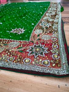 Green heavy party wear  handwork Saree