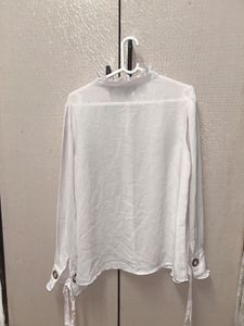 Elegant White Ruffled Blouse