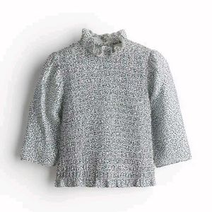 Smock top with flower detail