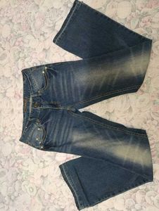 Thrifted 90s flared denim.