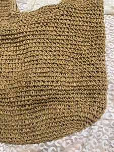 Woven straw shoulder bag