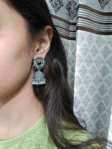 Silver Jhumka And Golden Diamond Earrings