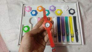 colourful watch with belts and ring watch is not working