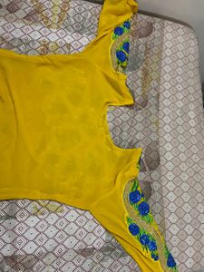 Yellow Kurta With Blue Patch Work