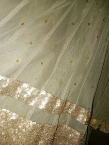 Elegant Grey Embroidered Gown for Festive Occasion