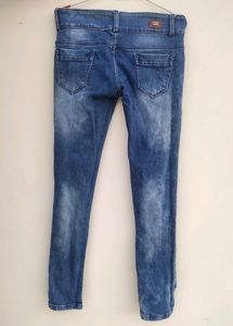 Women Ripped Faded Blue Jeans
