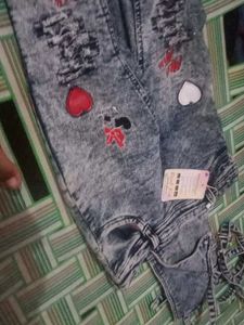 Embroidered Acid Wash Jeans
