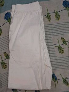 White Straight Pant With Embroidery Work At Bottom