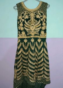 A Dark Green Coloured Lehenga,100% qualified,