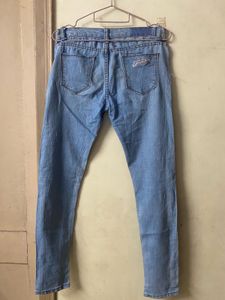 Ripped Knee Skinny Jeans