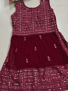 Red Mirror work lehanga with flared bottom and net
