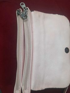 Chic Peach Clutch with Floral Detail