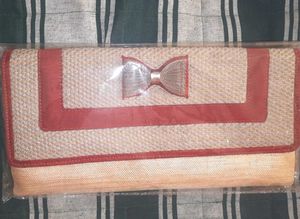 Red And Golden Clutch with Bow