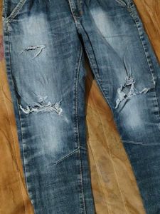 Ripped Blue Denim Jeans