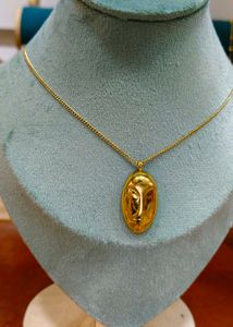 18k- Gold Plated Sun Pendant Necklace.