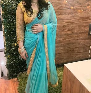 Elegant Aqua &amp; Gold Border Saree