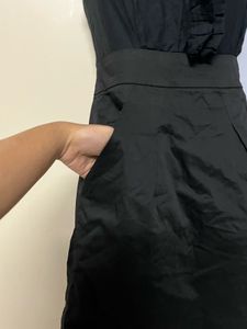 Pintrest Designer black bodycott piece with pocket