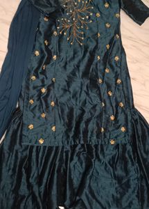 Its a Blue Dress.. With Beads Work On It.