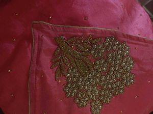 Rani Pink Saree With Golden Stones