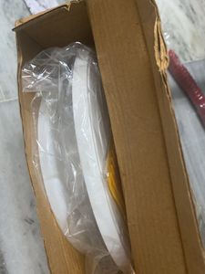 Rotating Table With Spatula For Cake Making A