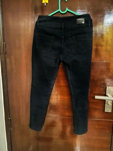 Charcoal Black Denim With The Brand Eleven Jeans. Fits The Best For Medium Size- 32 And 34.