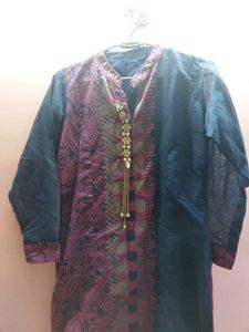 Blue kurti with brooch