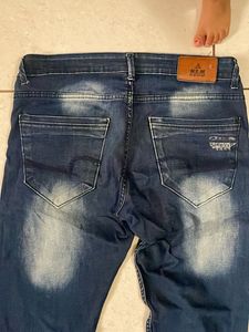 Distressed Denim Jeans
