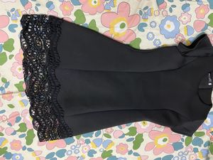 Chic Black Dress with Lace Hem