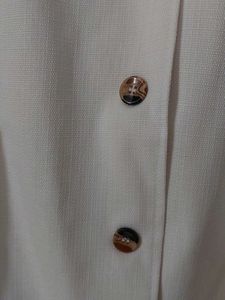 White Sleeveless waistcoat