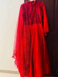 red colour flared dress with shall