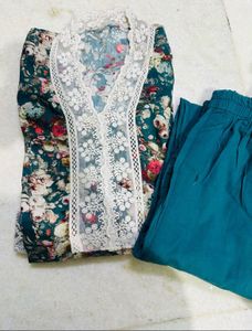 Trending Pakistani lace work suit