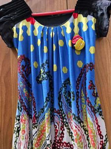Funky Patterned Top with Unique Sleeves