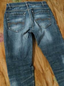 Ripped Blue Denim Jeans