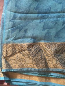 Blue Net Saree With Cream Border