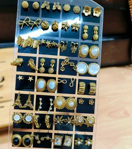 Gold Toned Multiple Design Earings 32 Pair At 450