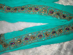 Elegant Teal Embellished Saree