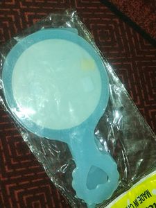 Small Mirror And Comb