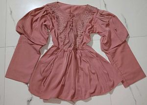 Stylish Peach Peplum Tunic With Lace Detail