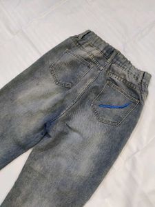 Women High-Rise Heavily Washed Distressed Jean