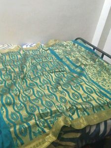 Elegant Teal & Gold Saree